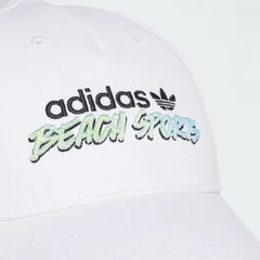 Close-up zoom on the fabric of the Adidas Originals Graphic Retro Baseball Cap, showing the soft cotton texture and the detailed embroidered logo.