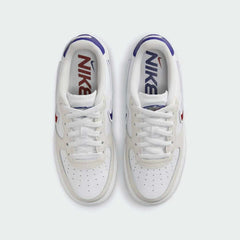 Top-down view of a pair of Nike Air Force 1 LV8 Juniors' trainers in white with colorful accents, highlighting the lace-up closure and iconic silhouette.