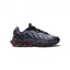 Side profile of the Nike Air Max DN8 Juniors' trainers in black mesh, showing the Gym Red Max Air units and the Light Smoke Grey midsole detailing.