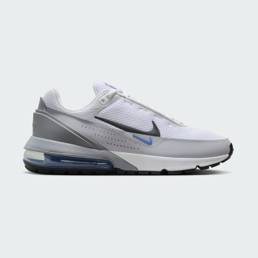 Nike Air Max Pulse Men's trainers in white with platinum tint and black accents, side profile showing visible point-loaded Max Air unit and layered textile upper.