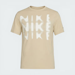 The Desert Khaki tee, highlighting the relaxed fit of the sleeves and the clean profile of the XL cut.