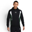The Black and Fir hoodie, highlighting the colour-blocked sleeves and the clean drape of the midweight fleece.