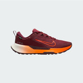 Nike Juniper Trail 2 GORE-TEX V2 men's trail shoes in burgundy with total orange accents, side profile showing engineered mesh upper and rugged rubber outsole.