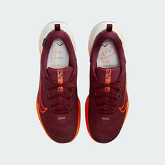 Top-down view of a pair of Nike Juniper Trail 2 GORE-TEX V2 men's trail shoes in burgundy, highlighting their durable construction and lace-up closure.