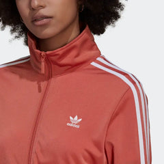 Close-up zoom of the full-zip hardware and the stand-up collar, highlighting the quality of the tricot material.