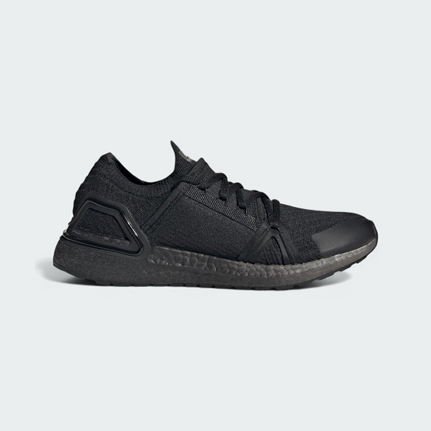 Adidas by Stella McCartney Ultra Boost 20 Women's trainers in black, side profile showing the Primeknit upper, chunky Boost midsole, and supportive cage.