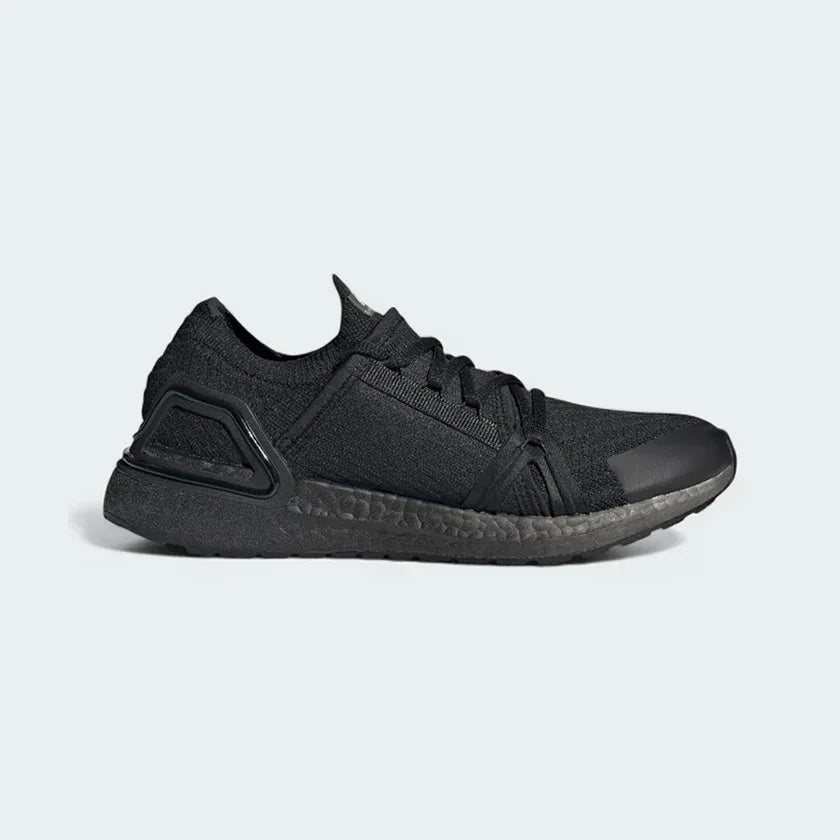 Adidas by Stella McCartney Ultra Boost 20 Women's trainers in black, side profile showing the Primeknit upper, chunky Boost midsole, and supportive cage.