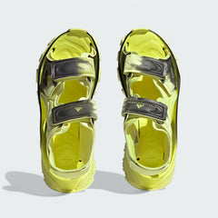 Top-down view of a pair of Adidas by Stella McCartney Hika Sandals in yellow, highlighting the multiple straps and footbed design.