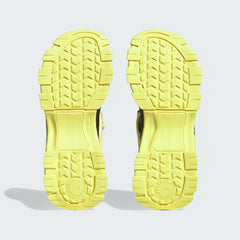 View of the outsole of the Adidas by Stella McCartney Hika Sandals in yellow, showing the durable tread pattern for grip.