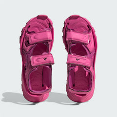 Top-down view of a pair of Adidas by Stella McCartney Hika Sandals in pink, highlighting the multiple straps and footbed design.
