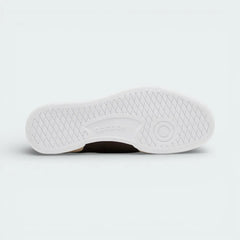 View of the durable rubber outsole in Stucco white, showcasing the classic heritage traction pattern for reliable grip.
