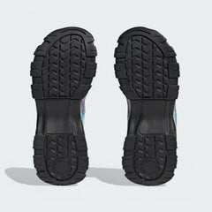 View of the outsole of the Adidas by Stella McCartney Hika Sandals, showing the durable tread pattern for grip.