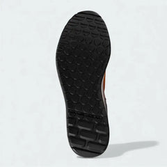 View of the outsole of the Adidas Five Ten Trailcross LT shoes, showing the durable Stealth Phantom rubber tread pattern optimized for flat bike pedals and hiking.