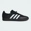 Side profile of the Black Velosamba COLD.RDY, highlighting the reflective white Three Stripes and the hi-tech textile upper.