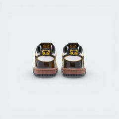 Rear view focusing on the Bright Citron heel tab with embroidered Nike branding and the clean white midsole.