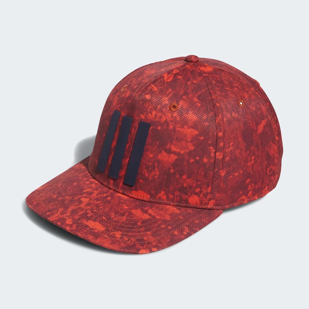 Adidas 3 Stripes Printed Tour Golf Cap in red, front view showing the pre-curved brim and 3D silicone 3-Stripes logo on the crown.