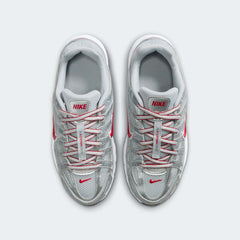 Top-down view of a pair of Nike P-6000 Juniors' trainers in silver, highlighting the intricate layered upper and lace-up closure.