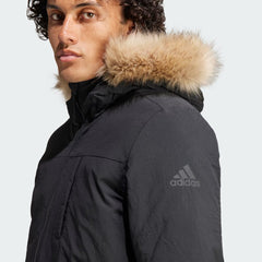 Close-up zoom on the fabric of the Adidas Hooded Fur Parka, showing the quilted puffer texture and subtle Adidas logo.