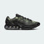 Nike Air Max DN Men's running shoes in black, side profile showing visible Dynamic Air unit in the heel, textured upper, and sleek silhouette.