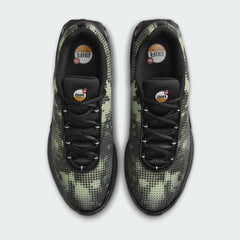 Top-down view of a pair of Nike Air Max DN Men's running shoes in black, highlighting their futuristic design and lace-up closure.