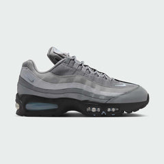 Nike Air Max 95 OG Men's running shoes in shades of grey with red and black accents, side profile showing visible Max Air units in the heel and forefoot, and a layered upper.