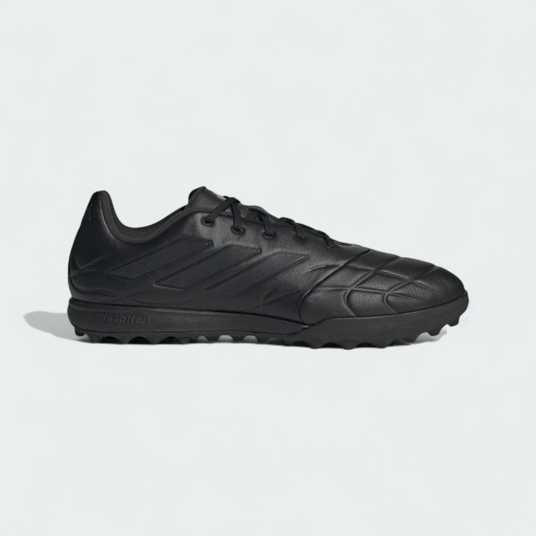 Adidas Copa Pure.3 Turf Men's football boots in black with a white heel, side profile showing the synthetic upper and turf-specific rubber outsole.