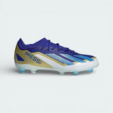 Side profile of the Adidas X Crazyfast Elite Messi Juniors' boots in Lucid Blue and White, showing the semi-translucent Aeropacity Speedskin and signature 3-Stripes.