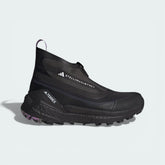 Side profile of the black and lilac Stella McCartney x Terrex Free Hiker, showing the elongated fashion-forward silhouette and the chunky BOOST midsole.