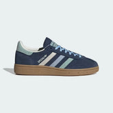 Side Profile Image: The Night Indigo Spezial, highlighting the Hazy Green Three-Stripes and the classic low-profile gum rubber sole.