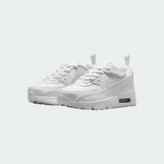 Angled view of two Nike Air Max 90 EasyOn Infants' trainers in white and silver, side by side, showcasing their timeless design.