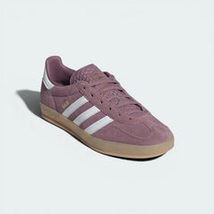 Three-quarter angle of the pair, emphasizing the gold-foil "Gazelle" branding and the contrast white heel tab.