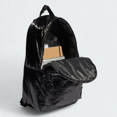 Inside view of the Adidas Puffy Satin Backpack open, showing the spacious main compartment and polyester lining.