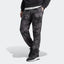 A pair of Adidas men's camouflage sweat pants with elastic waistband and zip pockets, in a gray and black color scheme.