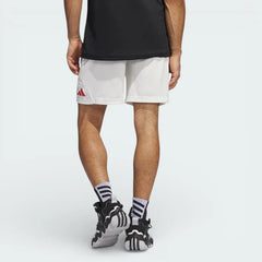White adidas Badge of Sport Basketball shorts looking from behind showing the red embroided logo on the leg