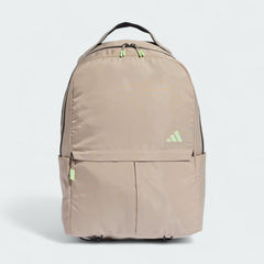 Adidas Women's Workout Backpack Yoga Bag in beige, front view showing main compartment zipper, front pocket, and external yoga mat strap.