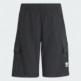 Adidas Juniors' Cargo Shorts in black, front view showing the elastic drawcord waist, side zip pockets, and cargo pockets with flaps.