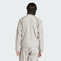 Adidas Superstar Bonded Track Top Men's in medium grey, back view showcasing the clean design and structured bonded fabric.