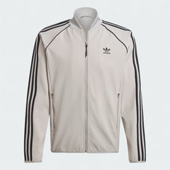 Adidas Superstar Bonded Track Top Men's in medium grey, front view showing full zip, stand-up collar, black 3-Stripes on sleeves, and embroidered Trefoil logo.