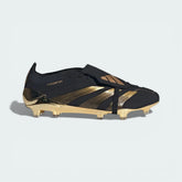 Side profile of the Core Black and Gold Bellingham Predator Elite, showing the metallic gold Three Stripes and the sleek aerodynamic silhouette.