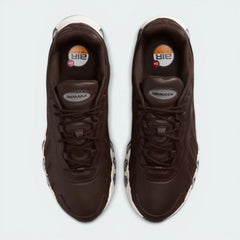 Top-Down View of Pair: Looking down at the tonal leather lacing system and the streamlined, low-profile silhouette.