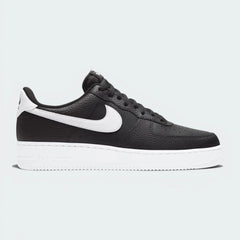 Highlights the iconic silhouette and the high-velocity contrast of the white Swoosh against the black leather.