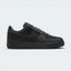 Highlights the high-velocity sweep of the Off-Noir leather Nike Swoosh, showing the professional, multi-textured contrast between the dark Anthracite canvas underlays and the premium leather overlays resting above the solid anthracite midsole wall.