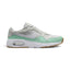Studio lateral shot of the Nike Women's Air Max SC in Platinum Tint and Mint Foam, highlighting the mixed leather, textile and mesh upper, white Swoosh, visible Max Air window in the foam midsole, and gum light brown rubber outsole.