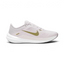 Highlights the high-velocity sweep of the Pacific Moss green Nike Swoosh, showing the professional texture of the Platinum Violet engineered mesh upper, the stitched accent bar, and the crisp white foam midsole wall.