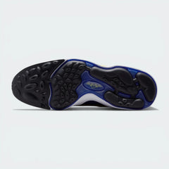Outsole View: Showing the unique pressure-mapped traction pods on the durable rubber sole.