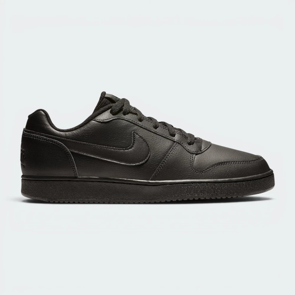 Highlights the high-velocity stitched design lines and the professional depth of the "Triple Black" finish.