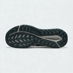 View of the outsole of the Nike Juniper Trail 2 Women's black trail shoes, showing deep, multi-directional rubber lugs for trail traction.