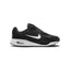 Displays the full lateral silhouette featuring the breathable black mesh upper, supportive synthetic leather mudguard overlays, the striking white side Swoosh, the thick white foam midsole, and the visible heel Air window.