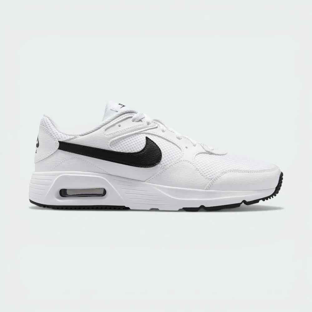 Side Profile Image: The White Air Max SC, highlighting the bold Black Swoosh and the iconic visible Max Air window in the heel.
