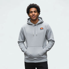 Ellesse Toce Overhead Hoodie Men's in light grey, worn by a model with hands inside the kangaroo pockets